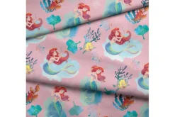 Disney Stitch Riding the Waves on Blue Fabric