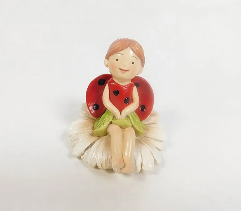 Fairy Sitting on Flower