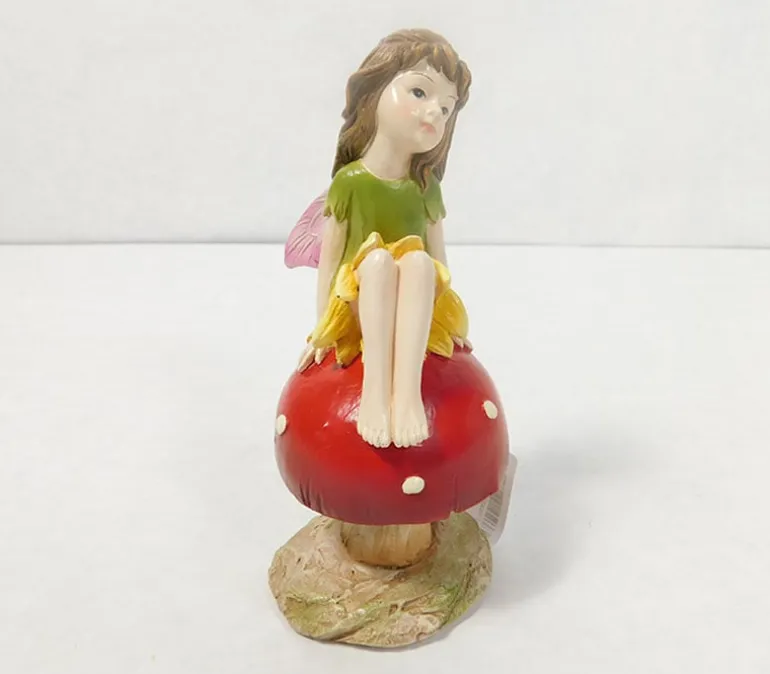 Fairy Sitting on Mushroom